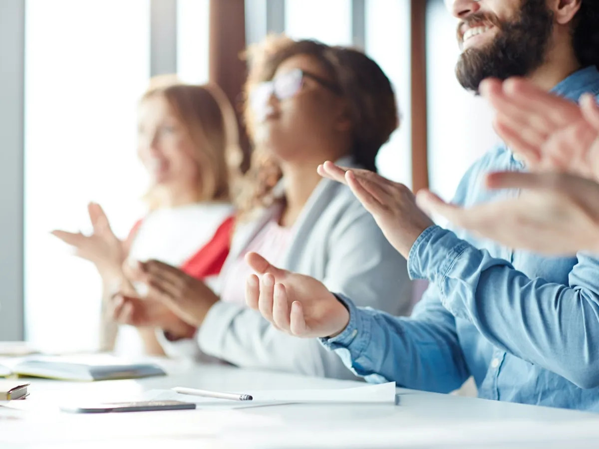 Team applauding medium